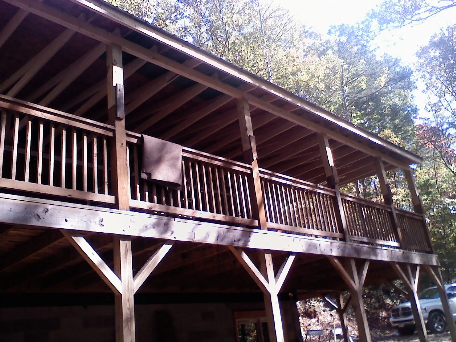 Timber framing under a new elevated porch and deck — Roof Leak Repair in Malibu by Roofing Brothers